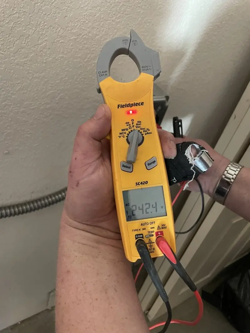 Voltage testing with clamp meter during Circuit Breaker Repair in Prattville